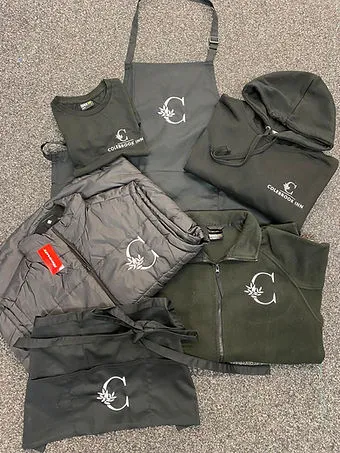 Colebrook-branded training top with embroidered logo and player number.
